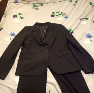 The limited black suit